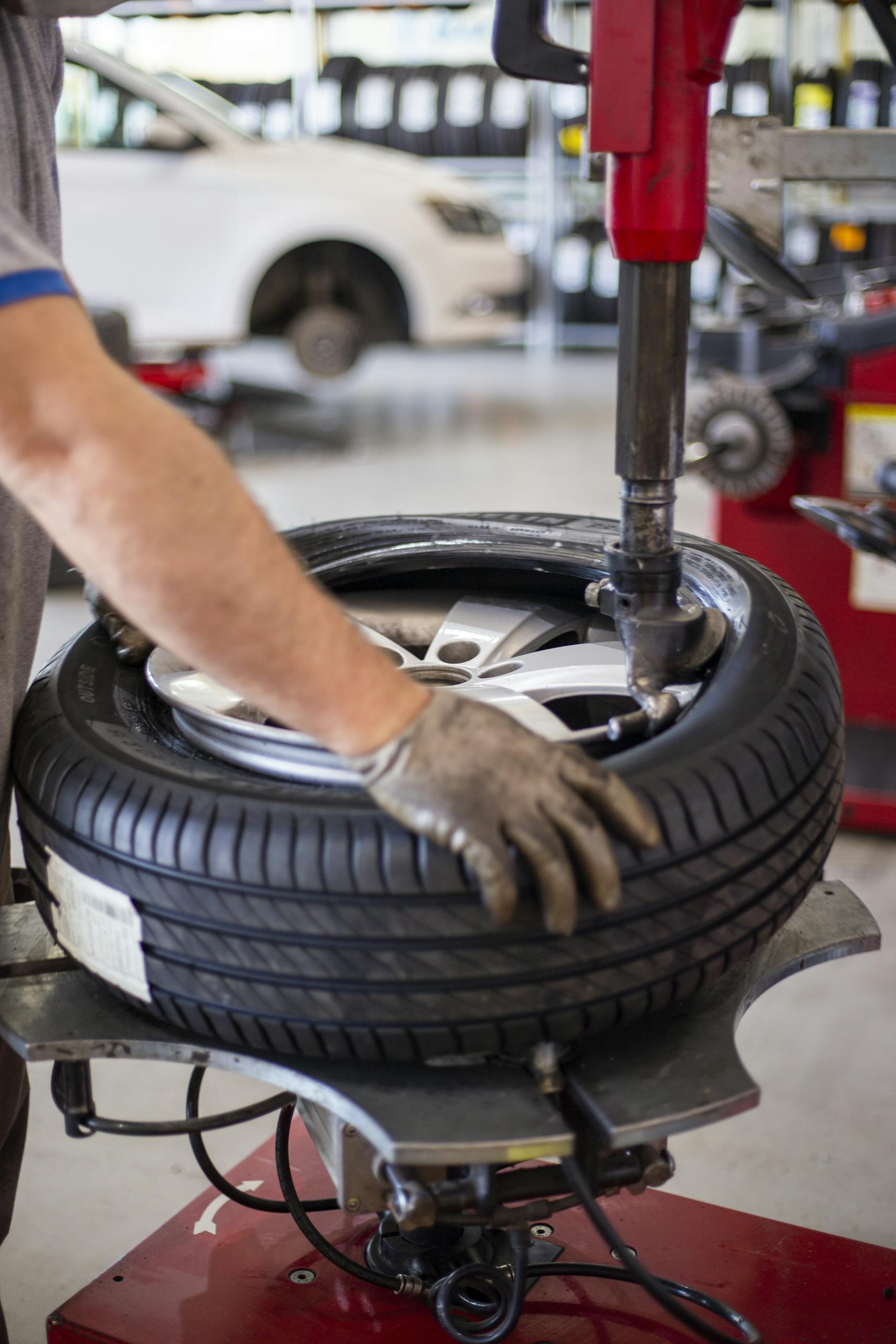 Person Holding a Tire